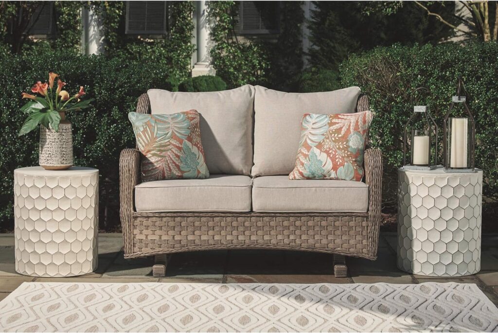 Signature Design by Ashley Clear Ridge Outdoor Handwoven Wicker Cushioned Loveseat Glider with 2 Throw Pillows, Light Brown